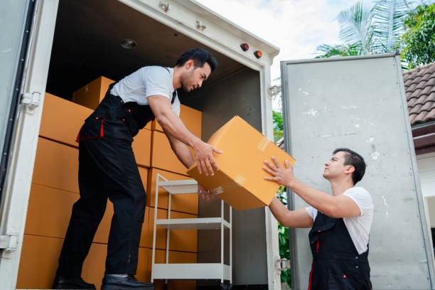 Unloading boxes into customer's new home